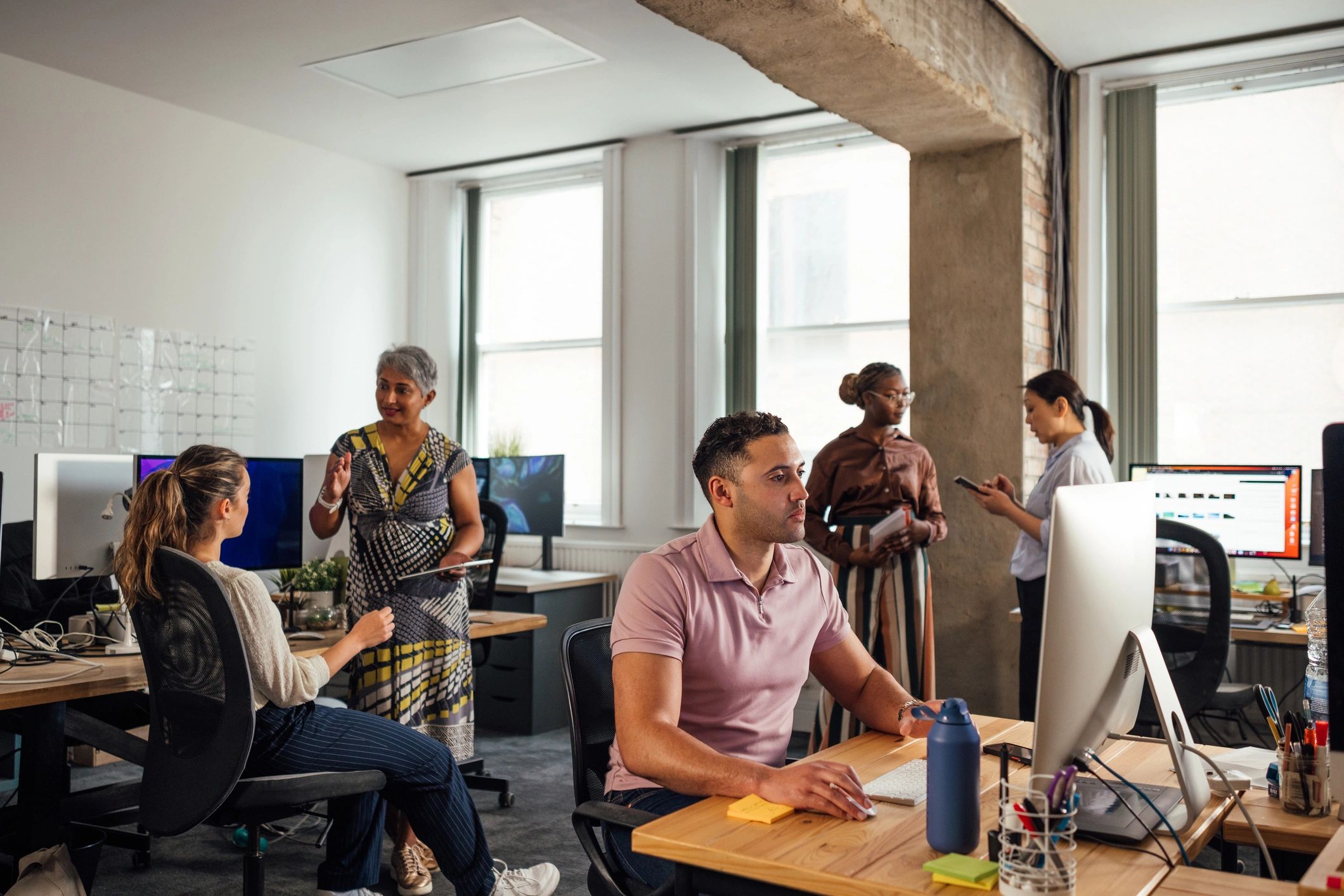Professional team working together in an office