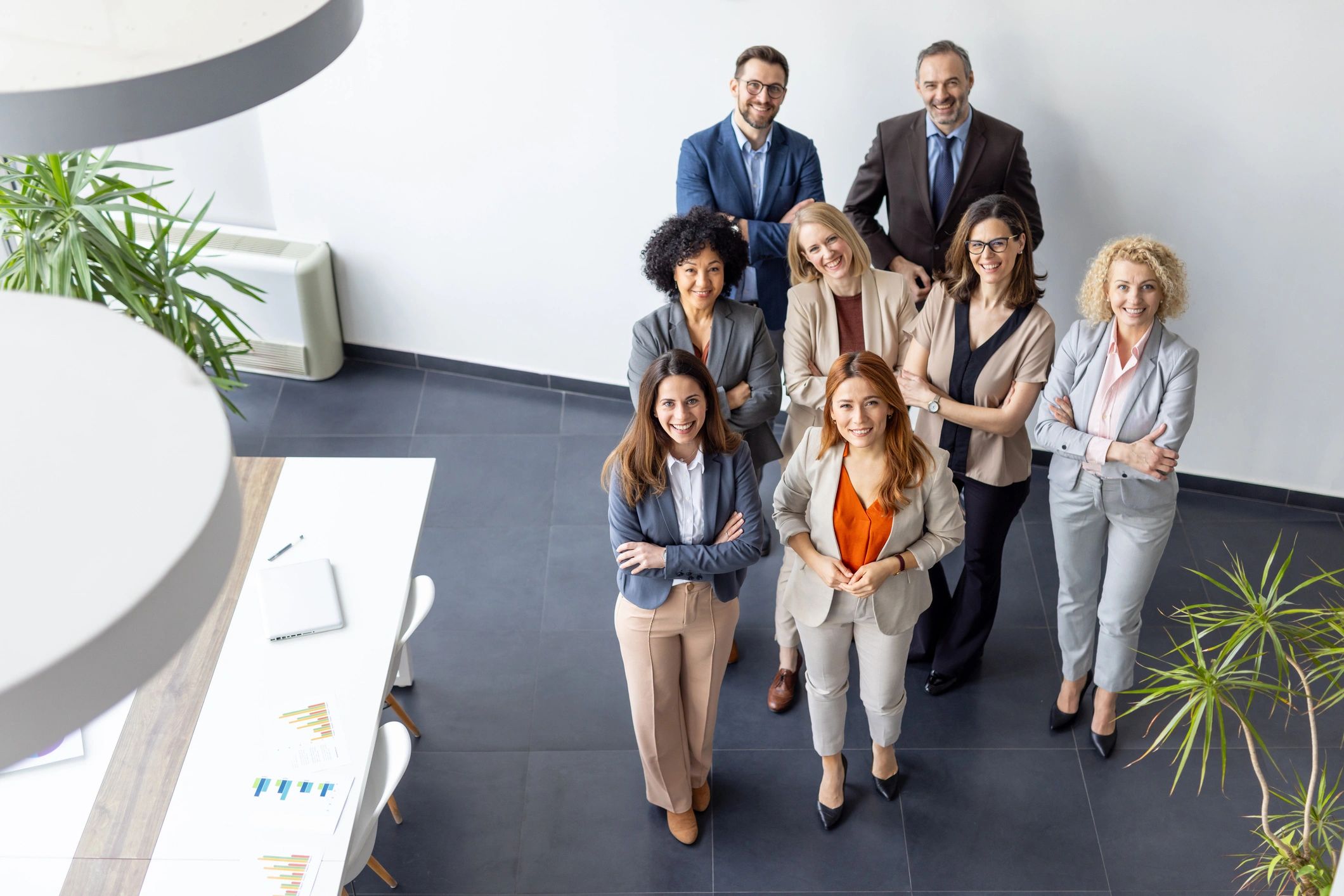 Professional team standing together in an office